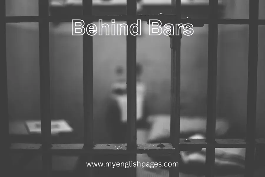 Idiom: Behind Bars - Meaning, Origin, and Examples